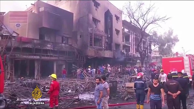 Twin bombings kill scores in Iraq’s Baghdad