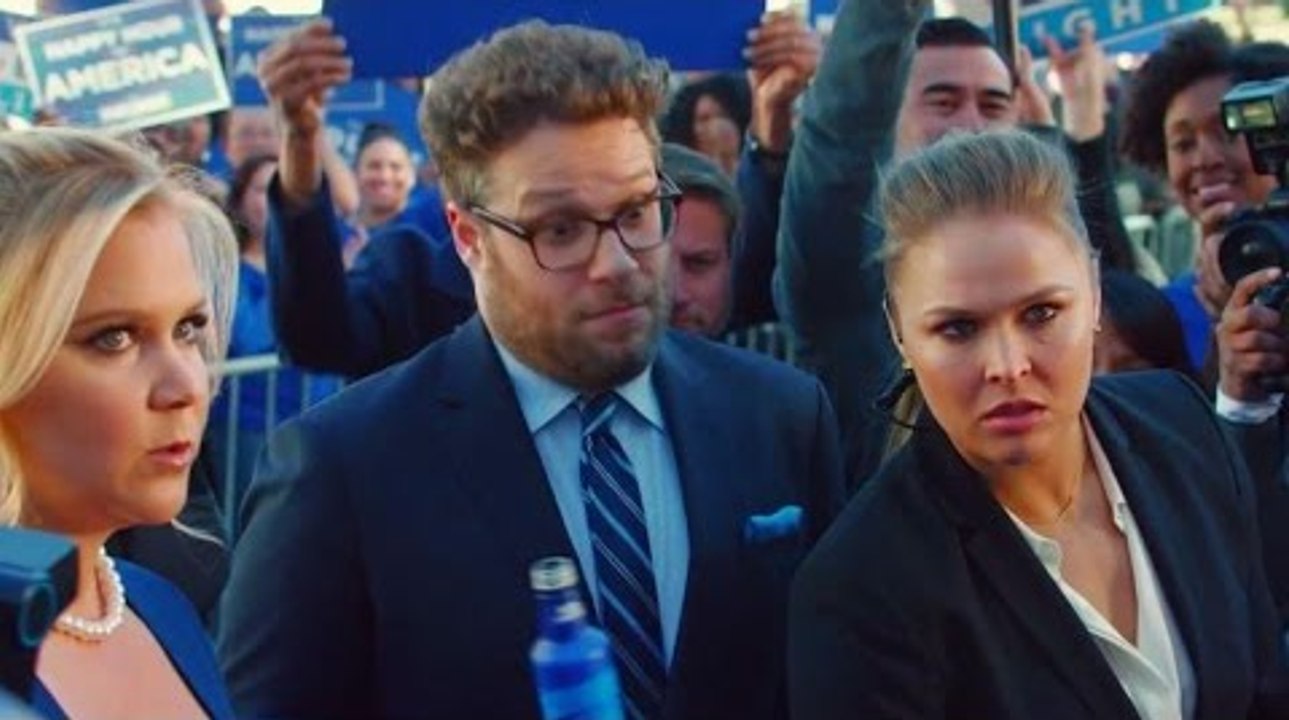 Tough bodyguard Ronda Rousey tackles Seth Rogen
