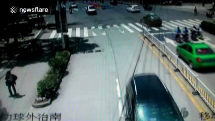 Reversing car crashes into shop