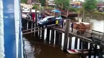 Car Attempting To Insanely Board A Ship Over A Plank