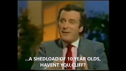 TERRY WOGAN GRILLS CLIFF RICHARD ABOUT 10 YEAR OLDS.1984