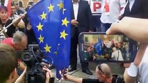 Burning European Union flag and the flags of the Islamic Wroclaw ( POLAND )