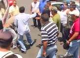Se enfrentan transportistas en Morelia, 20 combis fueron destruidas