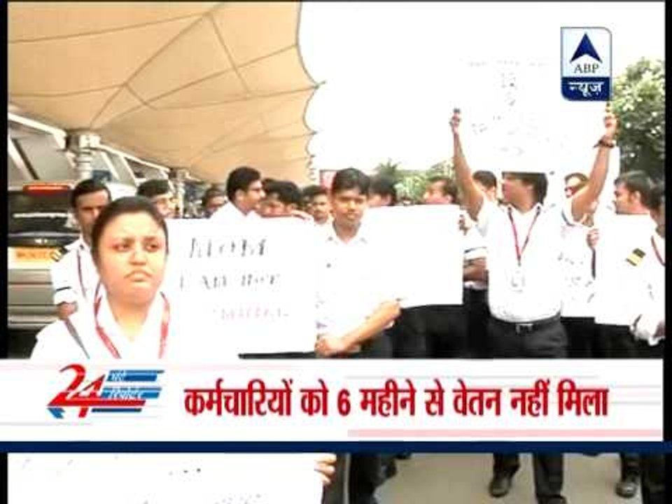 Employees of Kingfisher Airlines protest outside Mumbai airport
