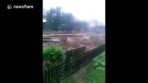 Severe flooding sweeps cars away