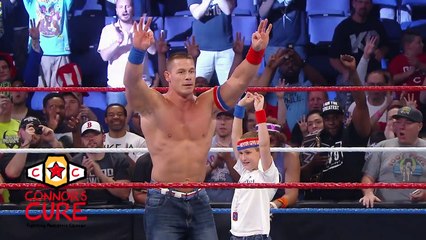 John Cena brings a brave WWE Universe member into the ring after Raw July 4, 2016
