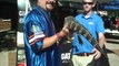 Dad holding Gator from Gatorland - UF Football Senior Day (Gainesville,  Florida, 11/20/2010)