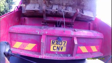 Cyclist uses rubbish lorry's slipstream to build up incredible speed