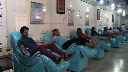Dozens donate blood in Baghdad after deadly attack