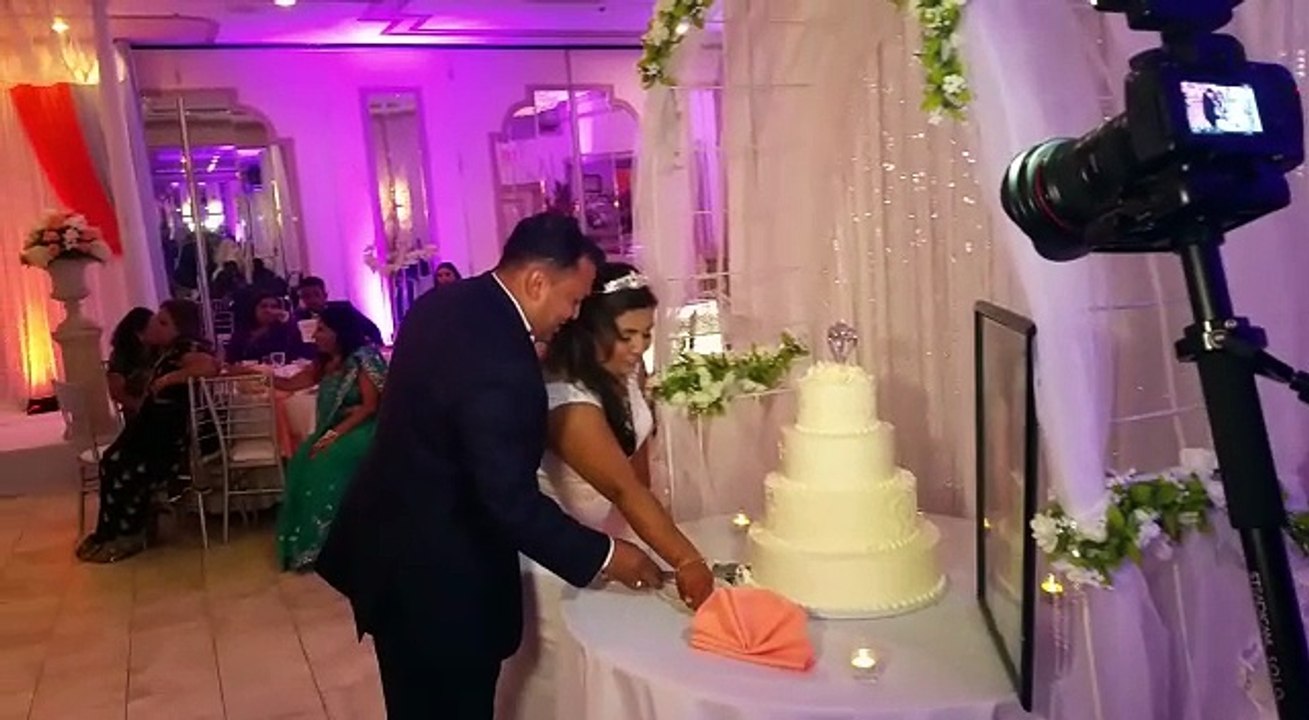 cake cutting at Gulbaz and Rhema's wedding