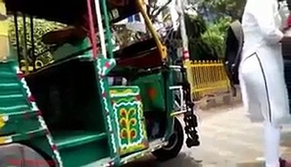 Girl wearing pajama climb at riksha