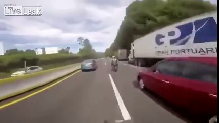 Woman pulls the hand break on a highway