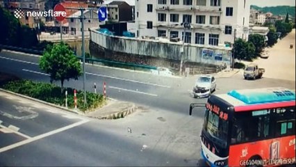 Car stops inches short of river after nasty crash