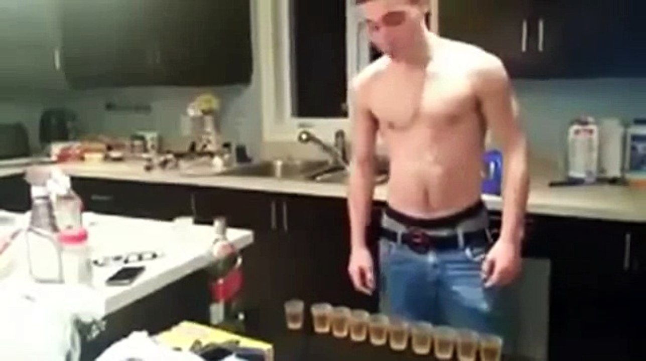 Guy drinks 10 shots of alcohol in 30 seconds