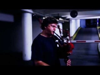 Bagpipe Music Echoes Around Carpark