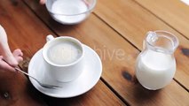 Hand Pouring Sugar By Teaspoon Into Coffee Cup 46 - Stock Footage | VideoHive 15750875
