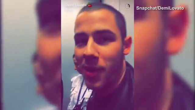 Demi Lovato & Nick Jonas appear together on Stephen Colbert show.