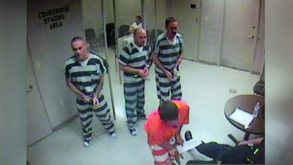 Prisoners break out of cell to help collapsed guard