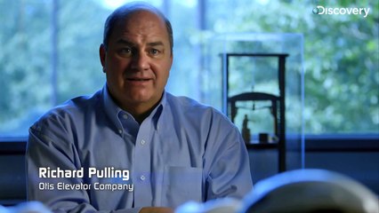 How was invented the safety elevator