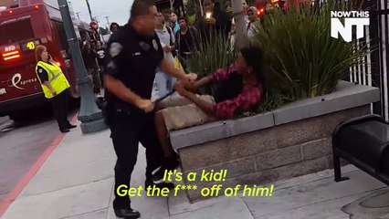 4 cops slam a kid down on the sidewalk for jay walking