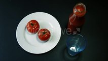 Hand Pours Tomato Juice From a Glass Bottle - Stock Footage | VideoHive 15471577