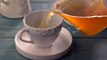 Glass Teapot Pouring Green Tea Into Cup On Wooden Table - Stock Footage | VideoHive 15647533