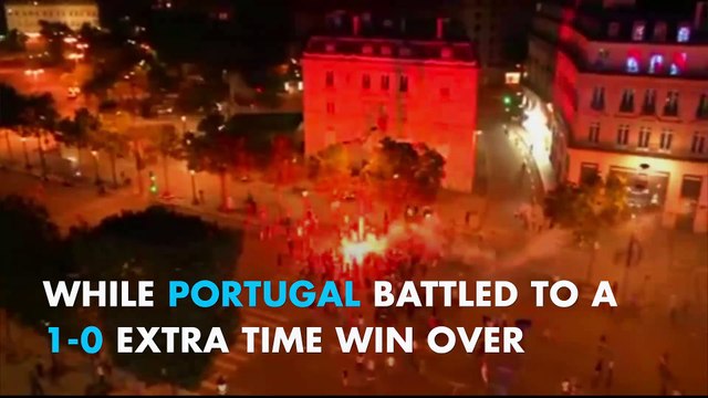 Hooligans clash with police underneath the Eiffel Tower during Euro 2016 Final