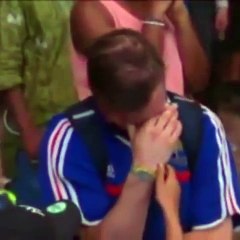 A Young Portugal Fan consoles a France Fan - Euro Cup Final 2016