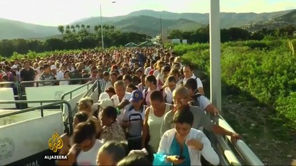 Thousands of Venezuelans pour into Colombia to buy food