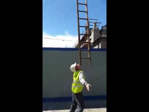 Irish Man Balances a Ladder on His Chin