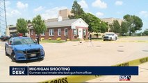 Michigan shooting: gunman was inmate who tool gun from officer