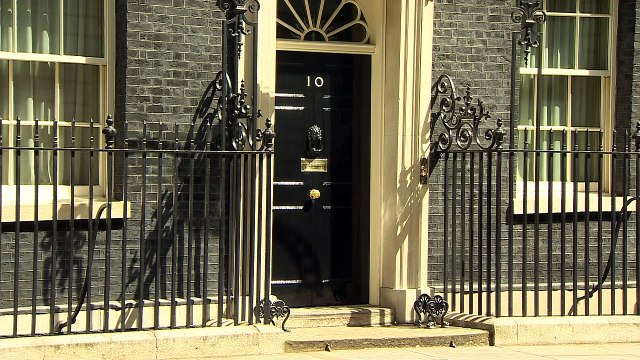 Theresa May leaves Downing Street and walks to wrong car
