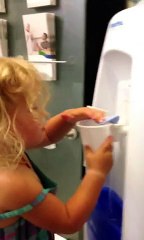 Little Girl Can't Figure Out Water Cooler