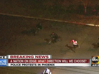 RAW: Man chased, tackled by officers during Phoenix protests