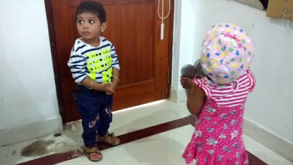 childrens are playing with bow and arrow