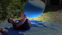slow mo guys popping huge balloon Funny Video