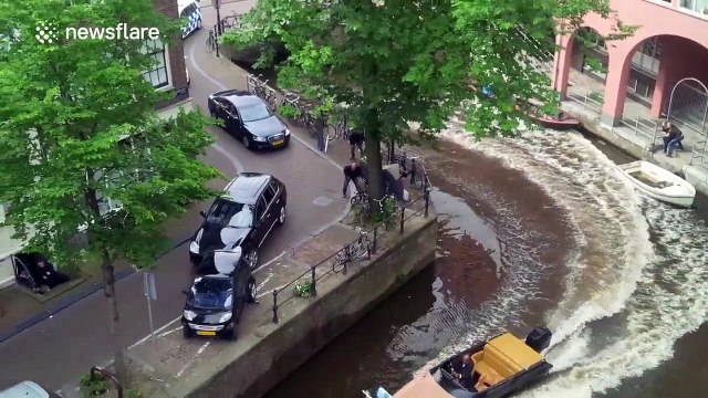 Porsche knocks Smart Car into canal while filming movie