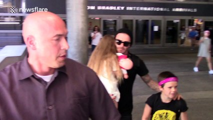 David Beckham arrives at LAX Airport with son Cruz and daughter Harper