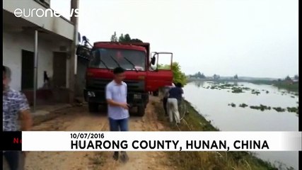 China: Trucks running into water
