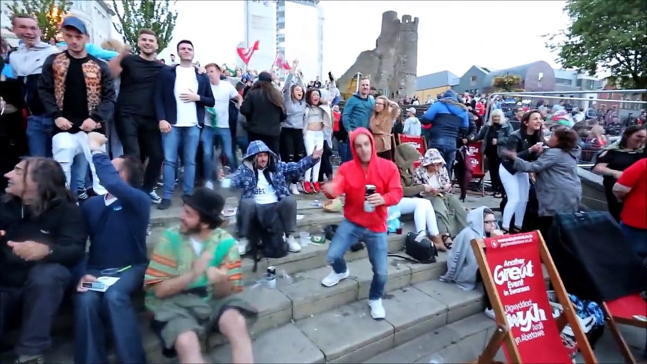 Wales Fans Celebrate Win Against Belgium At The UEFA Euro 2016 France