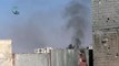 داريا 25-10-2013 تصاعد الدخان جراء سقوط القذائف على المباني غرب المدينة