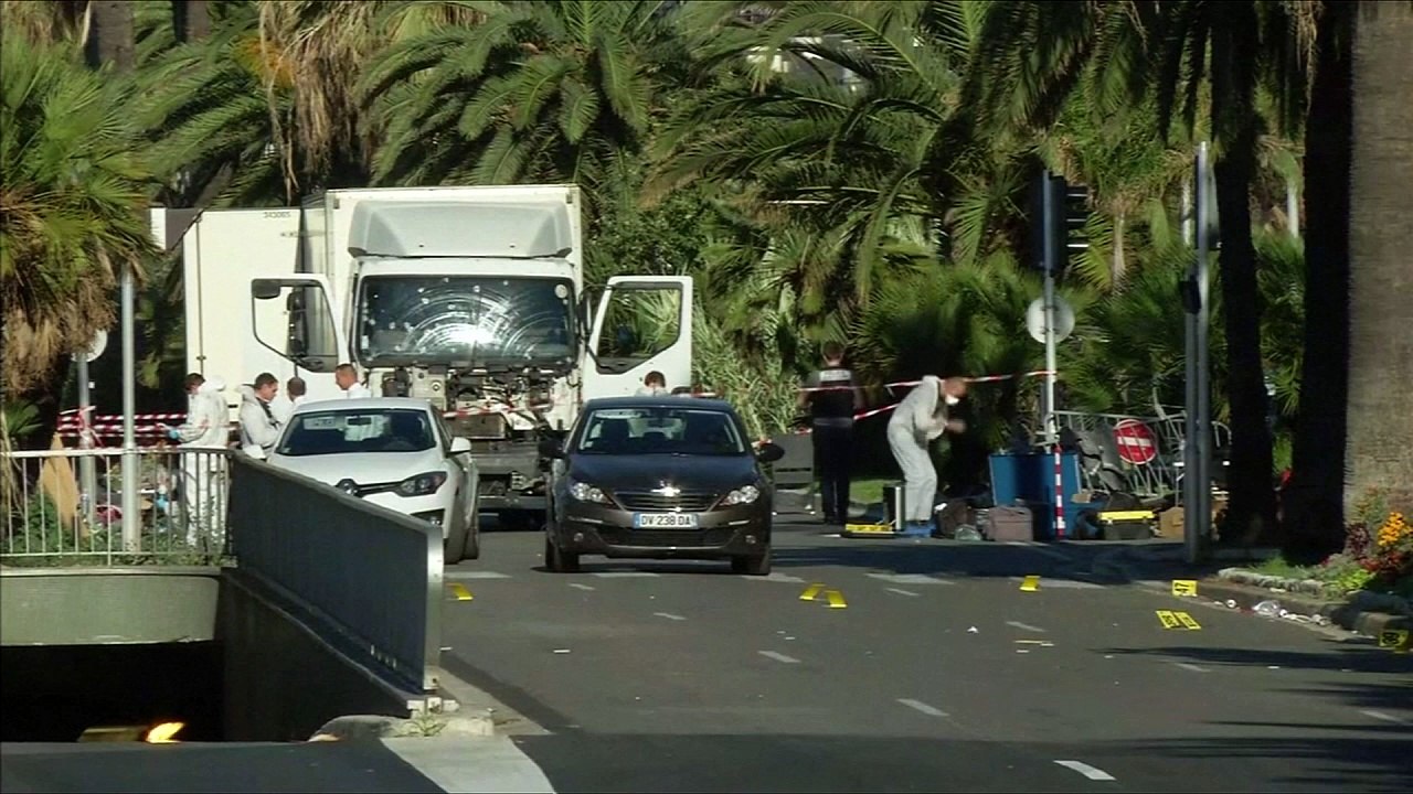 Nice attack: Forensics teams examine lorry