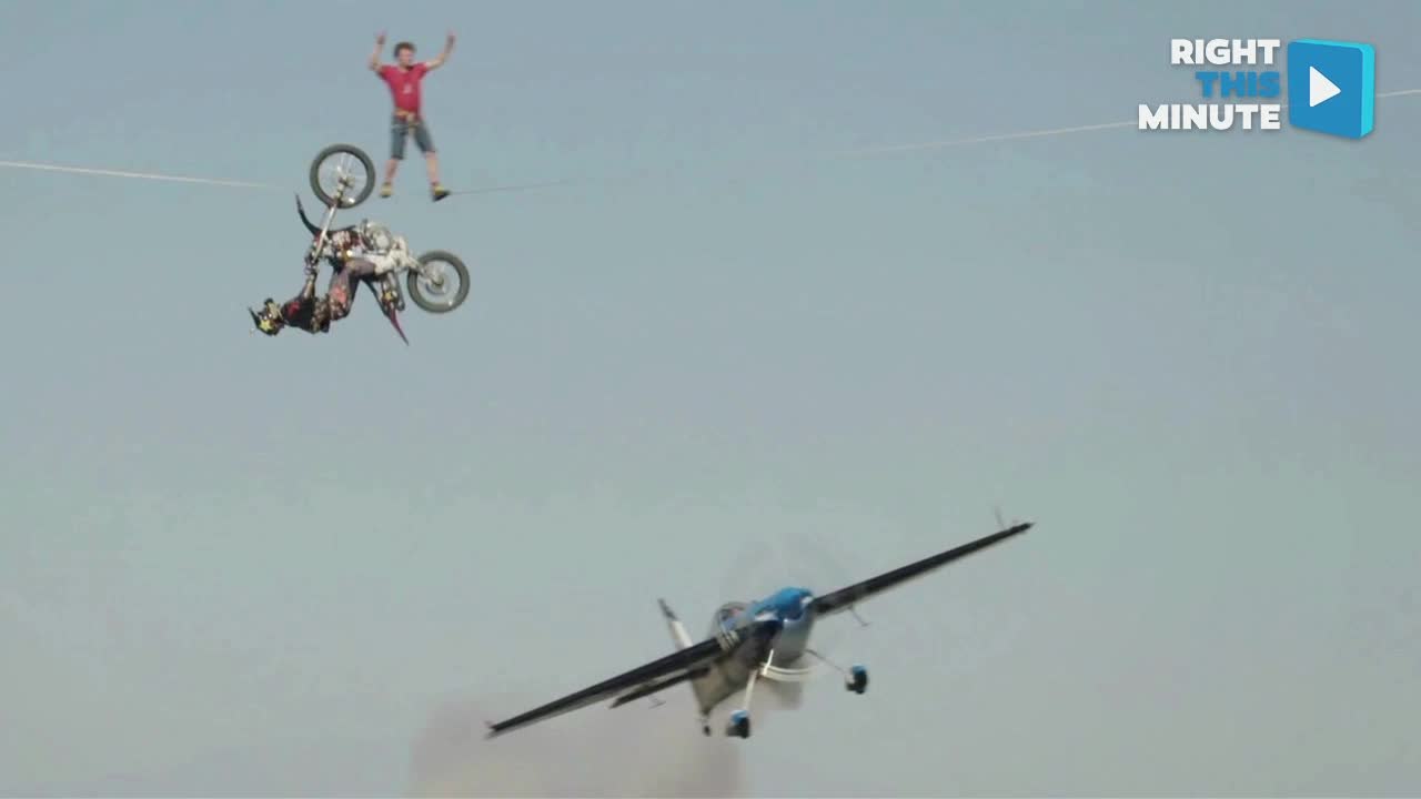 It's a Slackline, It's a Motorcyclist, It's a Plane... It's an Extreme Stunt