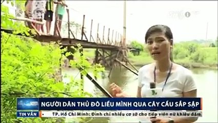 Người dân thủ đô liều mình qua cây cầu sắp sập.
