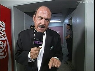 Mene Gene tries to guess, who is the third man? WCW Bash at the Beach 1996