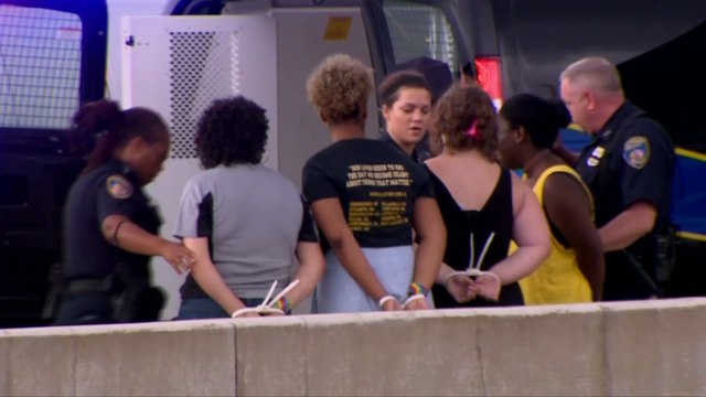 Dozens arrested in Baltimore at protests over police shootings