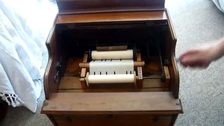 Celestina 20 note paper roll organ plays The Mikado