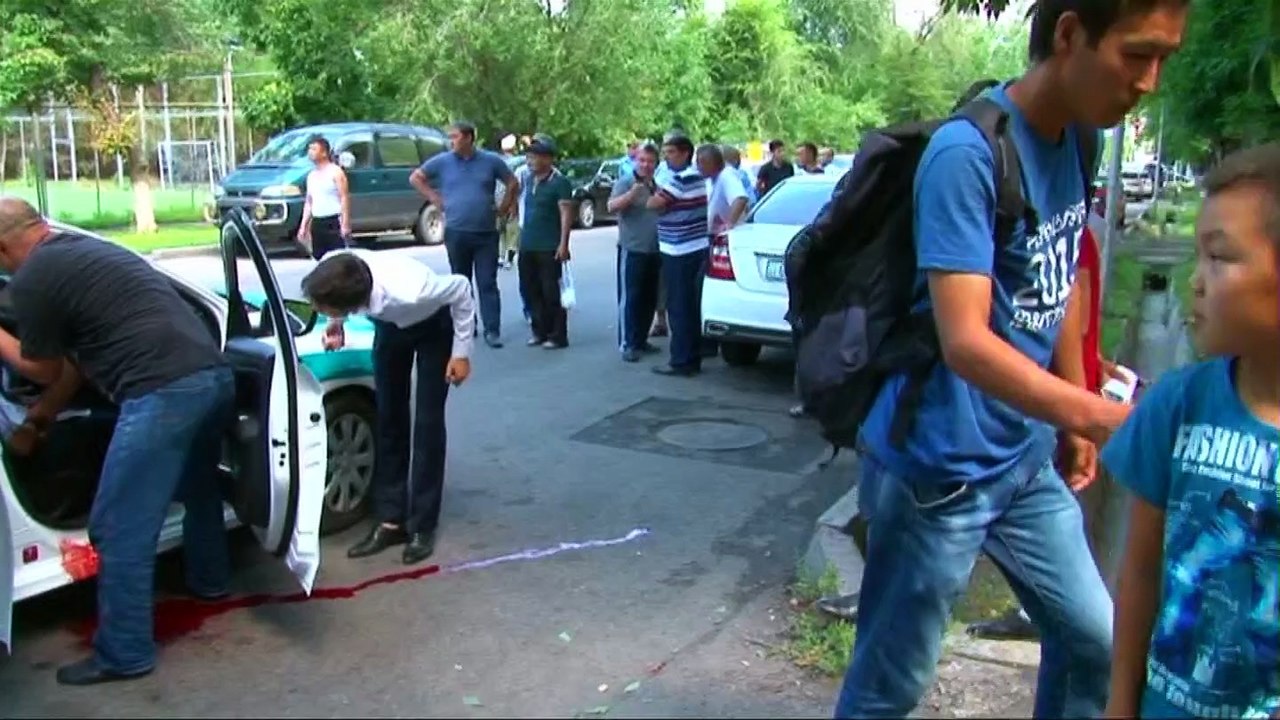 Kazakh police cordon off scene of deadly shooting in Almaty