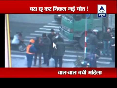 China: Woman narrowly escapes from getting crushed under a truck