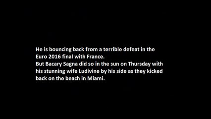 Bacary Sagna's bikini-clad WAG Ludivine looks incredible on the sands in a red bikini.